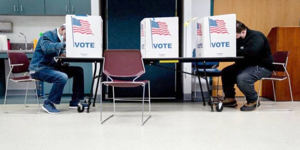 Voters fill out their ballots at an early voting center at the Mount Vernon Governmental Center on Oct.r 31, 2020 in Alexandria, Virginia. (File)