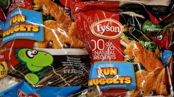 Tyson Foods frozen chicken products sit in the refrigerated section of a store in Washington