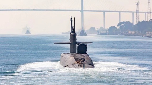 A picture shared by US Central Command appears to show a guided missile submarine in the Suez Canal passing under the Al Salam Bridge northeast of Cairo