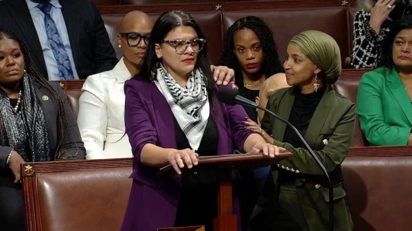 Democratic Rep. Ilhan Omar puts her hands on Tlaib’s shoulder to comfort the Michigan Democrat who teared up while delivering an impassioned speech on the House floor in support of Palestinians.
