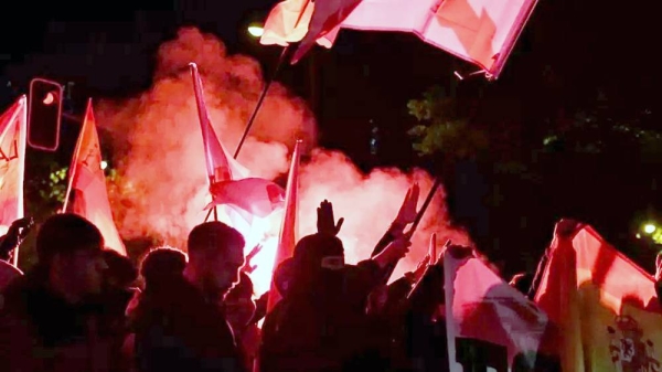 Thousands of protesters carrying flags and flares rallied outside Socialist party headquarters in Madrid on Tuesday night. —courtesy Europa Press News