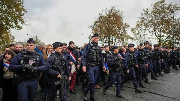 French police regulate thousands who gathered for a march against antisemitism in Paris, France on Sunday
