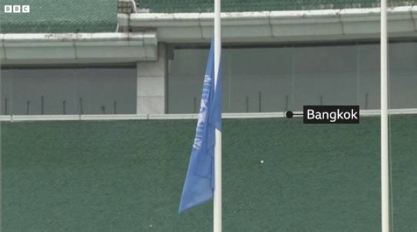 UN lowers flag to mourn deaths of its staff in Israeli attacks on Gaza.