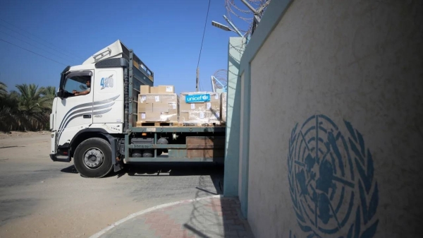 Workers of the United Nations Relief and Works Agency for Palestine Refugees (UNRWA) pack the medical aid and prepare it for distribution to hospitals at a warehouse in Deir Al-Balah, Gaza on October 25, 2023