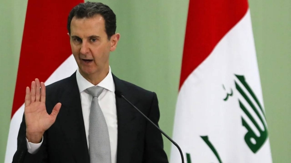 Syria's President Bashar al-Assad speaks during a press conference in July