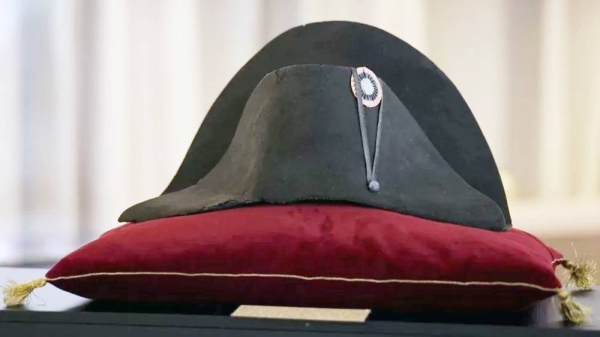 A “black beaver” felt two-cornered hat with an embroidered tricolor cockade belonging to French Emperor Napoleon Bonaparte, from the Collection Jean Louis Noisiez, is displayed before going on auction at Osenat auction house, in Paris, France, Nov. 6, 2023. — courtesy Reuters