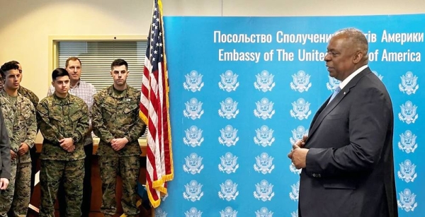 United States Secretary of Defense Lloyd Austin (R) speaks to employees of the US embassy in Kyiv during his visit to Ukraine on Monday. — courtesy Getty Images