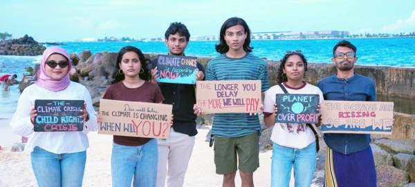 Young climate activists in Maldives highlight key messages, urging climate action. — courtesy UNICEF/Pun