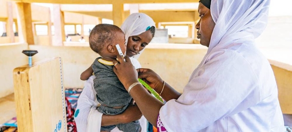 A child is treated for malnutrition at a mobile clinic at a displaced persons site in Mali. — courtesy UNICEF/Tiécoura N’Daou