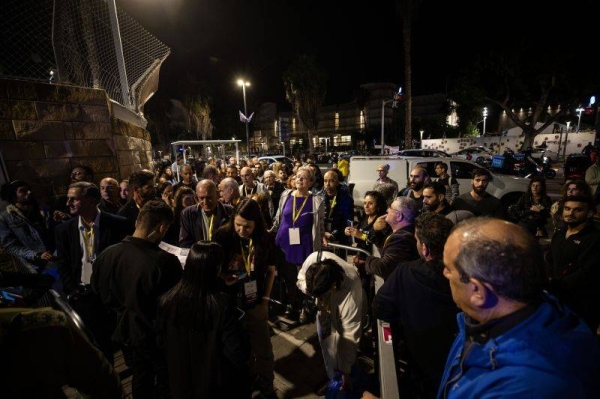 Family members of Israelis being held in Gaza gather in front of the defense ministry in Tel Aviv on November 20.