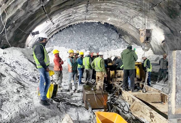 A high-powered drilling machine is airlifted in to assist in the tunnel rescue. — courtesy AshokKumar— IPS/X