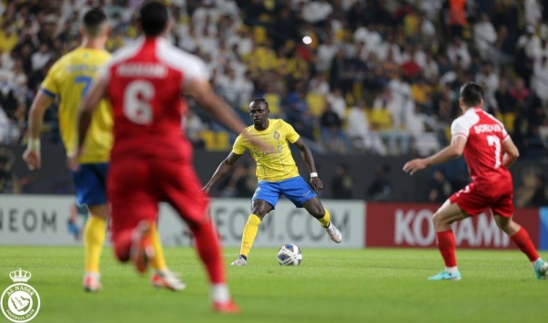 Al Nassr of Saudi Arabia secured their spot in the last 16 of the 2023/24 AFC Champions League as Group E winners on Monday, despite playing most of their match against Persepolis in Riyadh with 10 men, ending in a 0-0 draw.