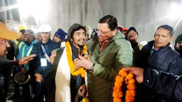 One of the trapped workers comes out after he was rescued from the collapsed tunnel site in Uttarkashi in the northern state of Uttarakhand, India, Tuesday. — courtesy Uttarkand government.