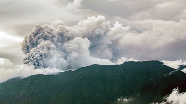 Volcanic ash spews from Mount Marapi during an eruption as seen from Tanah Datar in West Sumatra on Sunday. — courtesy AFP/Getty Images