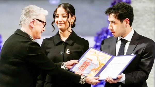 Leader of the Nobel Committee Berit Reiss-Andersen presents Ali and Kiana Rahmani, children of Narges Mohammadi, an imprisoned Iranian human rights activist, with the Nobel Peace Prize 2023, as they accept the award on behalf of their mother at Oslo City Hall, Norway. — courtesy Reuters