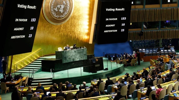 The results of a draft resolution vote are seen on a screen as the UN General Assembly holds an emergency special session on the Israel-Hamas war at the United Nations headquarters in New York on December 12, 2023