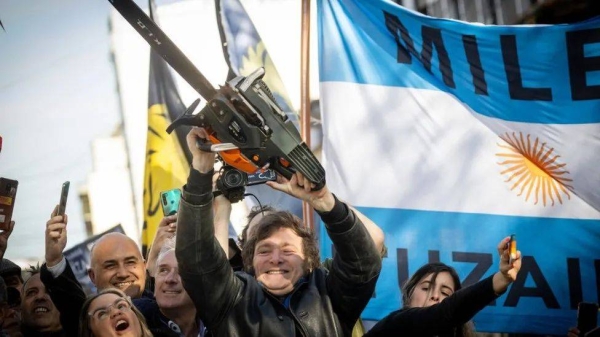 Javier Milei brandishing a chainsaw on the campaign trail to illustrate his plans to cut public spending