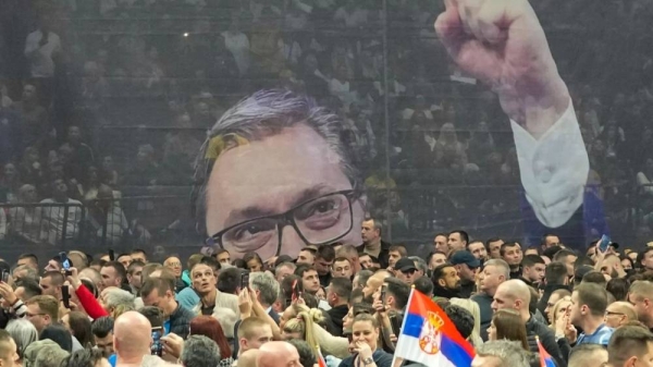 An image of Serbian President Aleksandar Vucic is seen during a pre-election rally of his ruling Serbian Progressive Party in Belgrade, Serbia, Saturday, Dec. 2, 2023