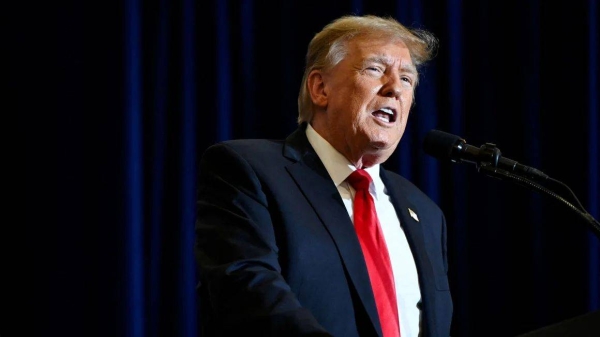 Former President Donald Trump speaks during a 'Commit to Caucus' event for his supporters in Coralville, Iowa, on December 13, 2023