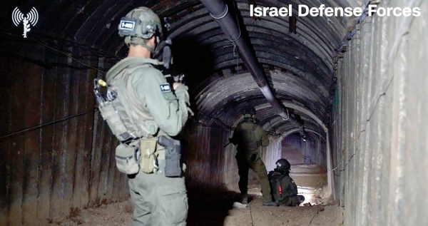 Israel Defense Forces soldiers gain access to a Hamas tunnel in Gaza in this screengrab from an undated video released by the IDF. — courtesy Israel Defense Forces
