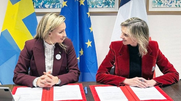 Sweden's Deputy Prime Minister and Energy & Industry Minister Ebba Busch (left) and France's Energy Minister Agnés Pannier-Runacher (right) sign the nuclear cooperation declaration in Brussels. — courtesy @AgnesRunacher on X