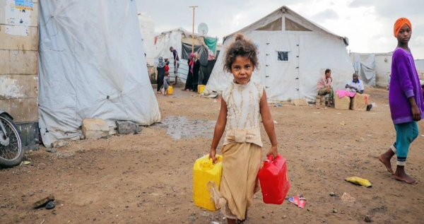 A child fetches clean water at a camp for displaced people in Dar Saad in Yemen. (file). — courtesy UNOCHA/Mahmoud Fadel-YPN