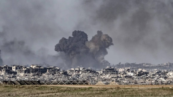 Smoke rising from Gaza is seen from Israel as the Israeli army's air, sea and land attacks continue on December 26, 2023