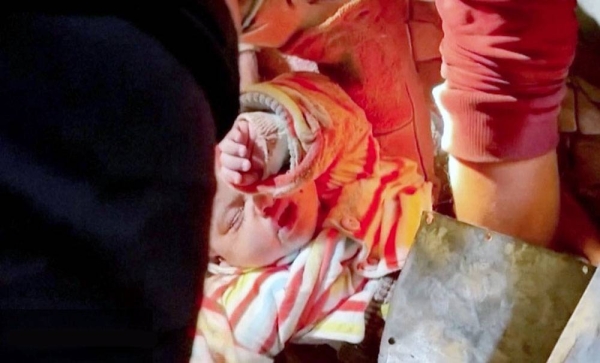 Baby pulled alive from Gaza rubble after Israeli air strike on Rafah