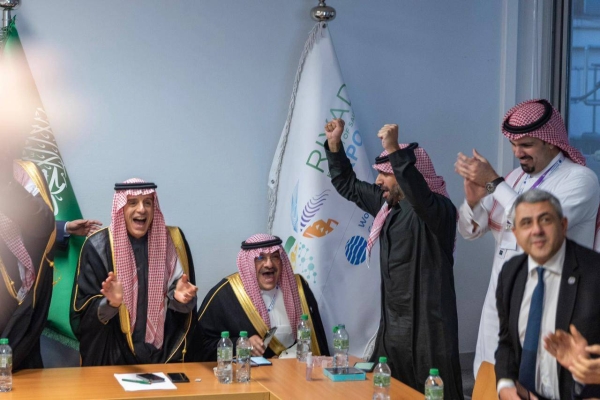 Saudi Culture Minister Prince Badr bin Farhan, Minister of State for Foreign Affairs Adel Al-Jubeir, State Minister Mohammed Al Al-Sheikh, and Riyadh's Mayor Prince Faisal bin Ayyaf celebrate the triumphant moment of Riyadh winning the Expo 2030 bid. (Photo by Ali Al Arifi) 
