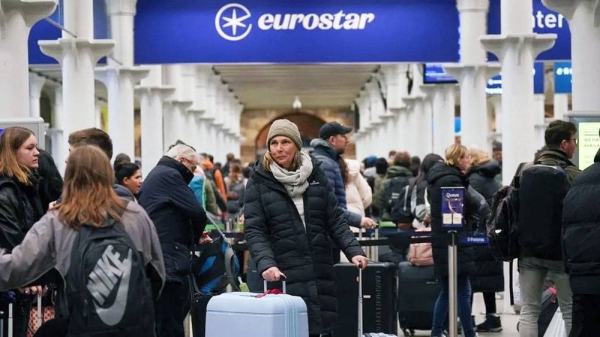 Passengers at the entrance to Eurostar in St Pancras International station, — courtesy PA Media