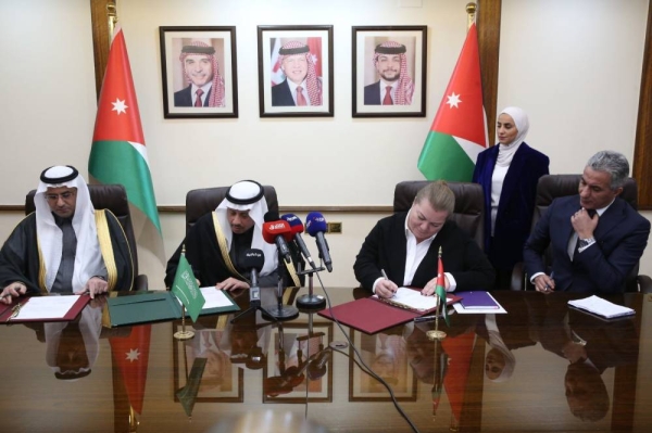 Jordan’s Minister of Planning and International Cooperation Zeina Toukan and Saudi Ambassador Nayef Al-Sudairi attending the ceremony of transferring Saudi grant to Jordan in Amman.