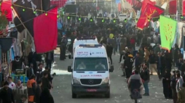 The ambulance leaves the scene of the blast.