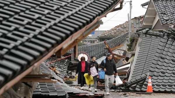 Japan earthquake: Woman in 90s found alive under rubble five days later