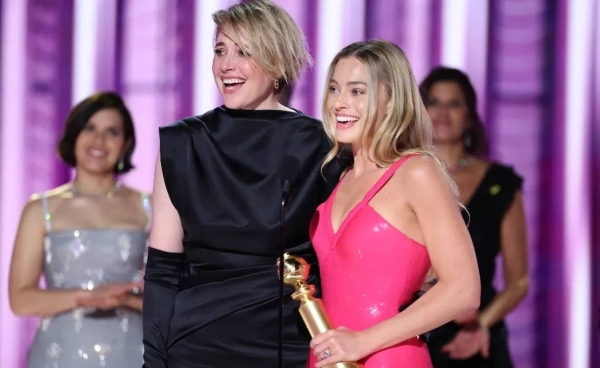 Barbie director Greta Gerwig and actress Margot Robbie accepted the box office achievement award