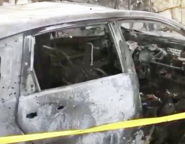 Screenshot of the wreckage of the car hit by the Israeli airstrike in the Lebanese village of Majdal Selm Monday.