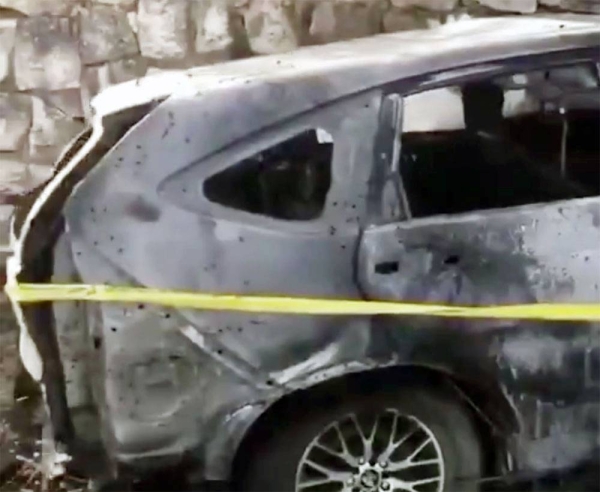 Screenshot of the wreckage of the car hit by the Israeli airstrike in the Lebanese village of Majdal Selm Monday.