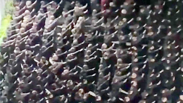 Hundreds of men given neo-fascist salutes in Rome. — courtesy Paolo Berizzi/La Repubblica