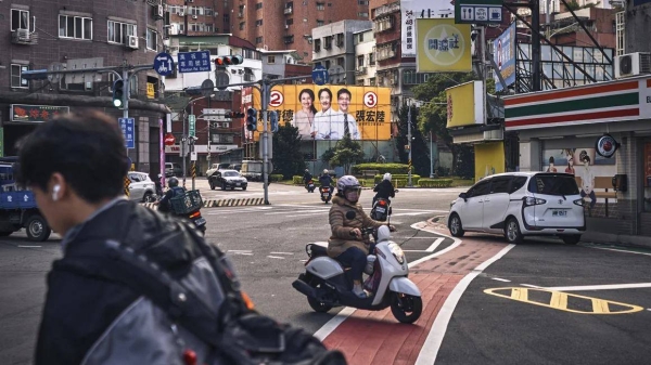 A campaign poster for the Democratic Progressive Party (DPP) in Taipei, Taiwan, on Wednesday, Dec. 27, 2023