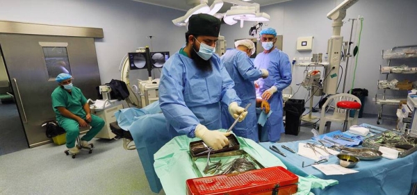 Surgeons operate on a patient at Al-Quds hospital in Gaza. (file). — courtesy WHO