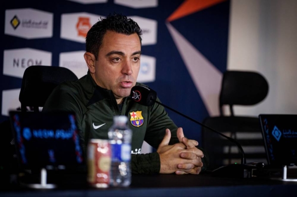 Xavi speaking at the press conference on Riyadh. 