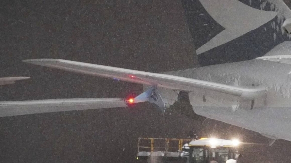 The wing of a Korean Air plane (left) clipped a Cathay Pacific aircraft (right) in a collision at Japan's New Chitose Airport on January 16, 2024