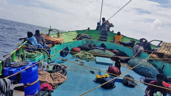 An image provided by one of the migrants shows people on the deck of a boat before landing on Diego Garcia