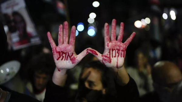 Relatives and supporters of the Israeli hostages held in the Gaza Strip by Hamas attend a protest calling for their release outside Israel's parliament on Monday