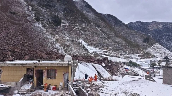 Rescue workers in Zhenxiong county are working in sub-zero temperatures