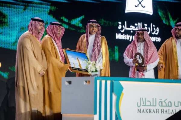 Minister of Commerce Dr. Majed Al-Qasabi and Sheikh Abdullah Saleh Kamel, chairman of the Board of Directors of the Makkah Chamber of Commerce and Industry, during the opening session of Makkah Halal Forum in Makkah on Wednesday.
