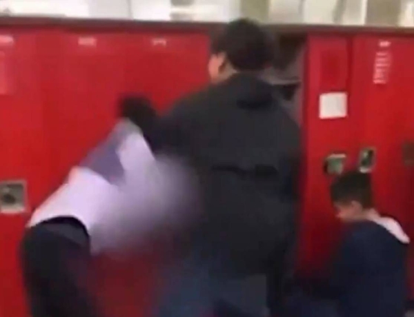 Video footage showed the schoolgirl being placed in a headlock and shoved to the ground.