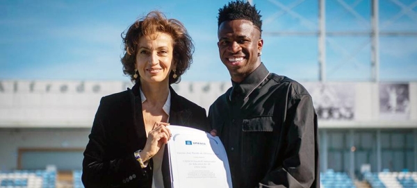 
UNESCO Director-General Audrey Azoulay and Brazilian footballer Vinícius Junior, newly-appointed Goodwill Ambassador for Education for All, during a ceremony at the Real Madrid training center. — courtesy UNESCO/Juan Barbosa