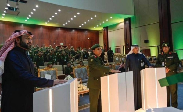 Director General of Passports Lt. Gen. Suleiman Al-Yahya and other high-ranking officials launch the new Absher and Muqeem services in Riyadh on Wednesday
