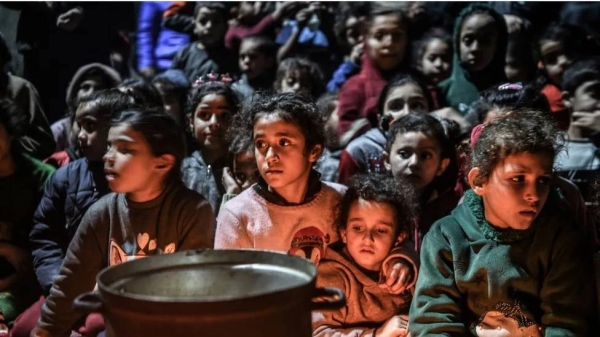 Children sheltering at a school in Rafah on Thursday