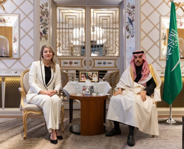Prince Faisal bin Farhan meets with Canadian Foreign Minister Mélanie Joly in Munich on Friday.